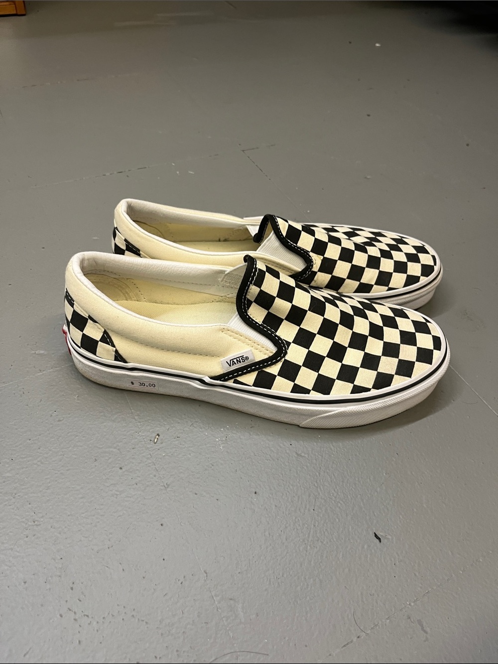 Vans Checkerboard Slip-On Sneakers in Black and Cream